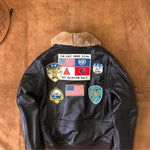 Load image into Gallery viewer, Men&#39;s Brown Leather Bomber Jacket with Fur Collar Embroidery Badges Air Force G1 Flight Coat
