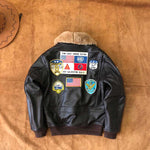 Load image into Gallery viewer, Men&#39;s Brown Leather Bomber Jacket with Fur Collar Embroidery Badges Air Force G1 Flight Coat

